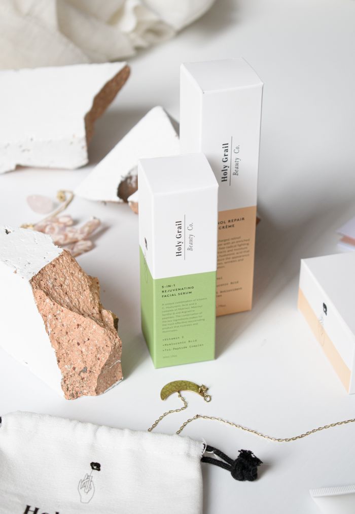 Services Stylish arrangement of skincare packaging with natural materials, ideal for branding.